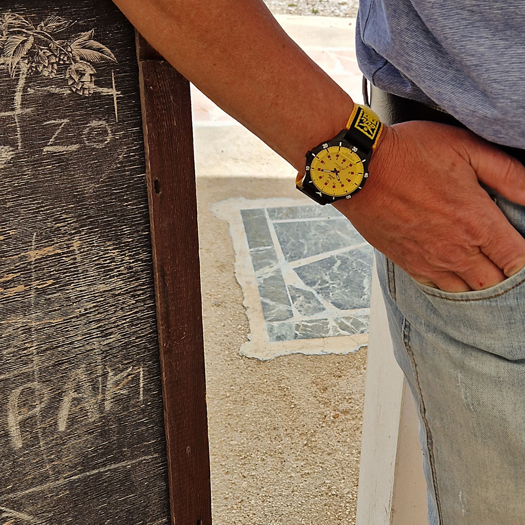 GUL No.1 All yellow on the wrist with light blue jeans