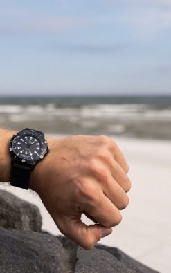 black Waterproof watch from gul watches on mans arm