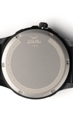 Back view of a black wristwatch showing the metallic case back with brand logo and text engravings.