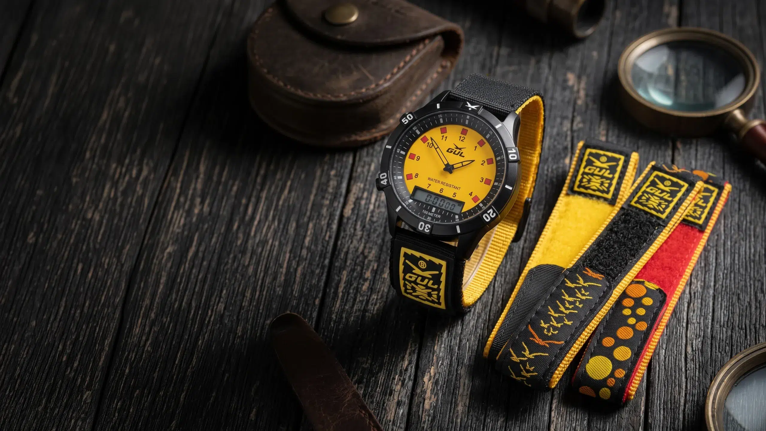 banner ana digi watch with velcro straps on wooden surface