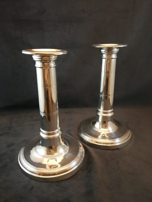 A pair of silver candlesticks