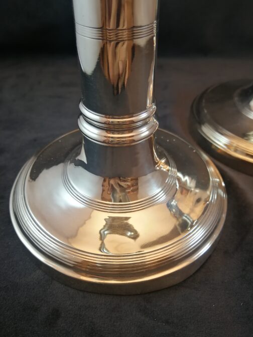 A pair of silver candlesticks