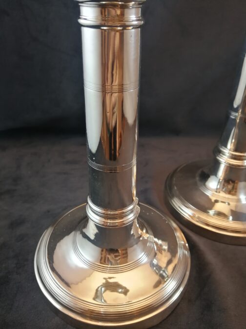 A pair of silver candlesticks