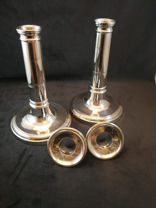 A pair of silver candlesticks