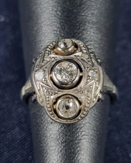 White gold ring with two old mine cut diamonds