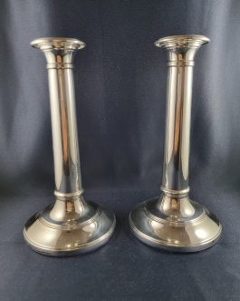 A pair of silver candlesticks