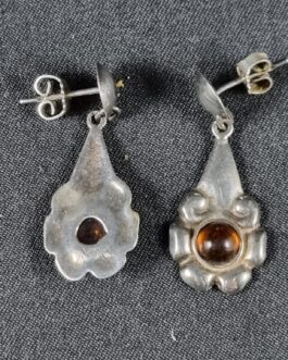 A pair of silver earrings