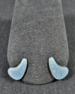 A pair of silver and enamel ear clips