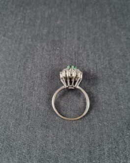 White gold ring with emerald and diamonds