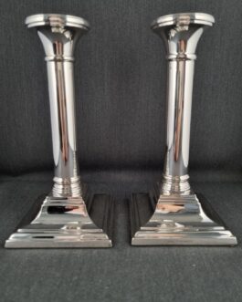 A pair of silver candlesticks