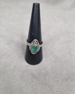 Silver ring with green stone