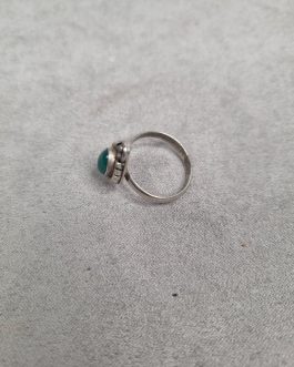 Silver ring with green stone