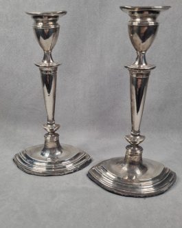 A pair of English silver candlesticks