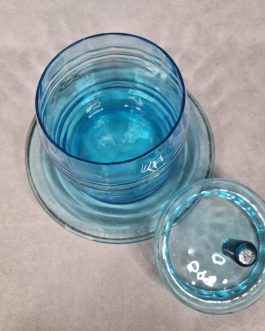 Glass jar with lid and saucer