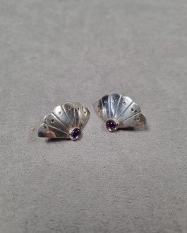 A pair of silver ear clips