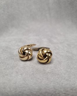 A pair of 14 karat gold cufflinks