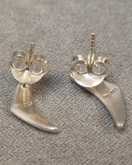 A pair of silver stud earrings