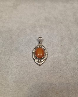 Silver pendant with amber