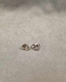 A pair of silver earrings