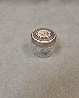 Small glass jar with metal lid with enamel decoration