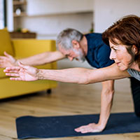 Image showing two patients exercising following hernia surgery, an important part of recovery with Hernia Clinic Hampshire.