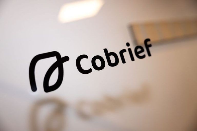 Cobrief-logo på vegg.