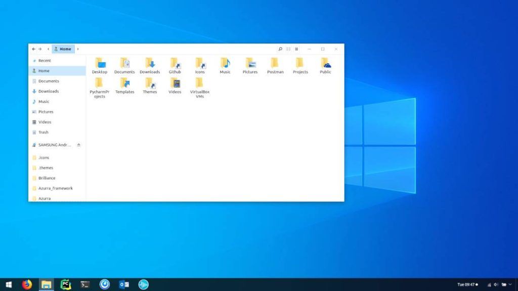 Linux-skrivebord med Windows-lignende utseende, viser filbehandling med mapper og oppgavelinje.
