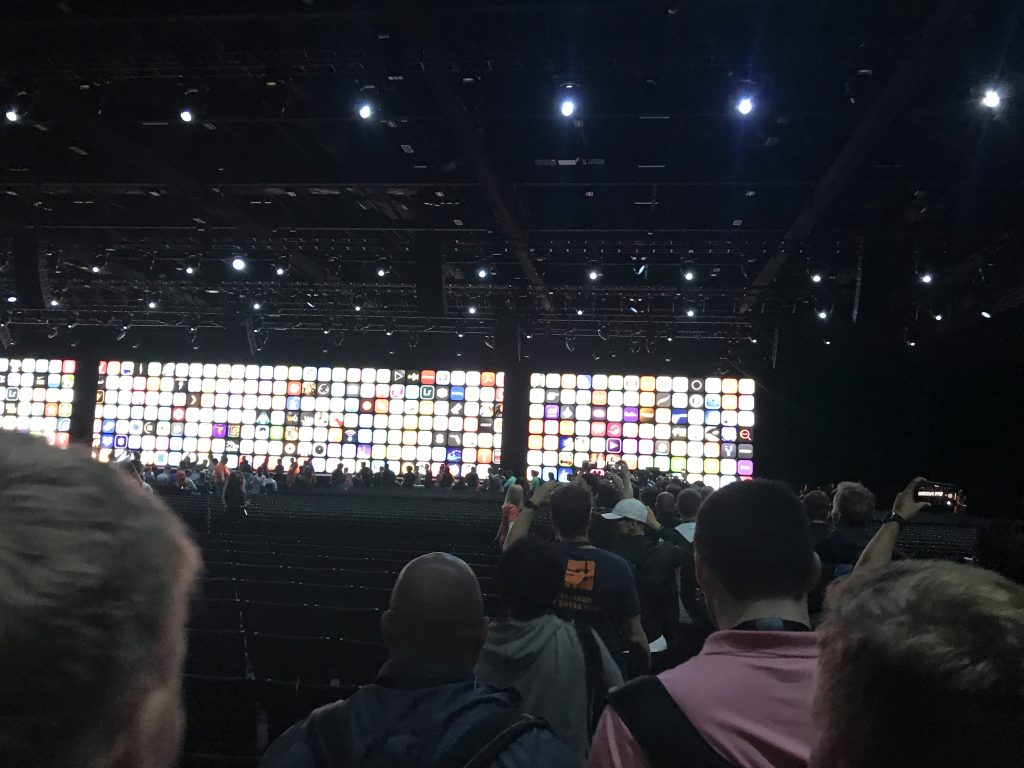 Many people hurrying to the front of the keynote stage