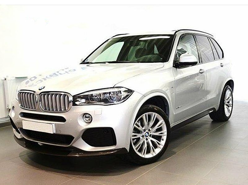 Silvermetallic BMW X5 Xdrive 40D stulen i centrala Stockholm