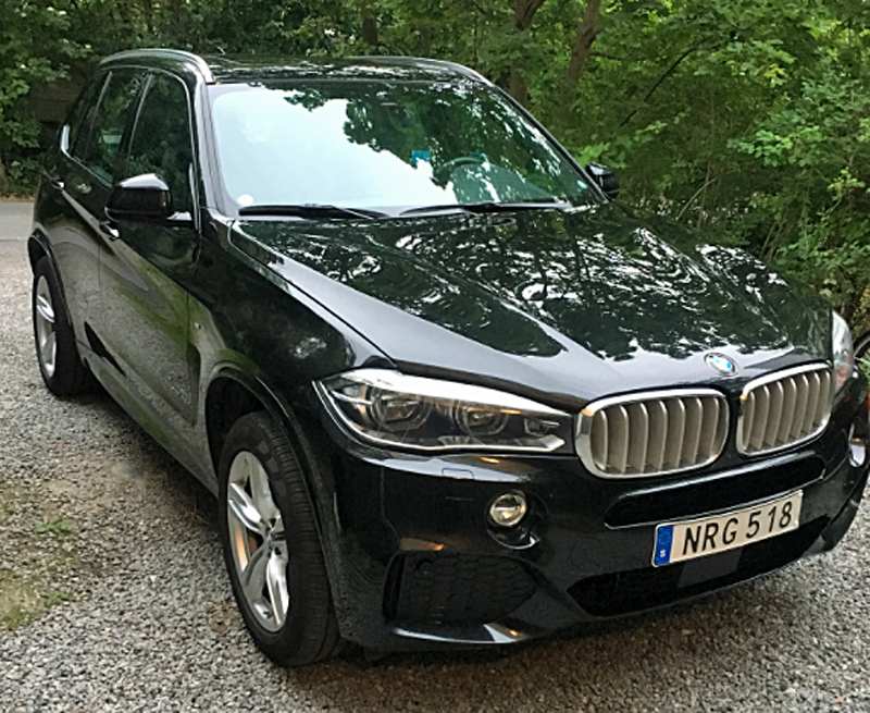 Svart BMW X5 Xdrive 40D stulen i Bromma, Stockholm