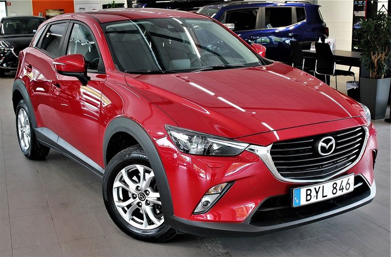 Röd Mazda CX-3 stulen i Kungsängen