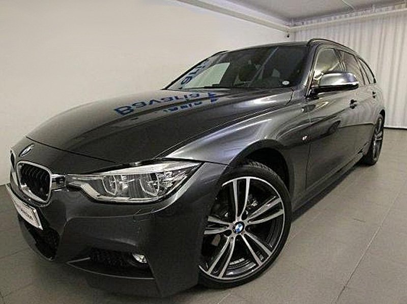 Svart BMW 320D Xdrive Touring stulen i Sollentuna