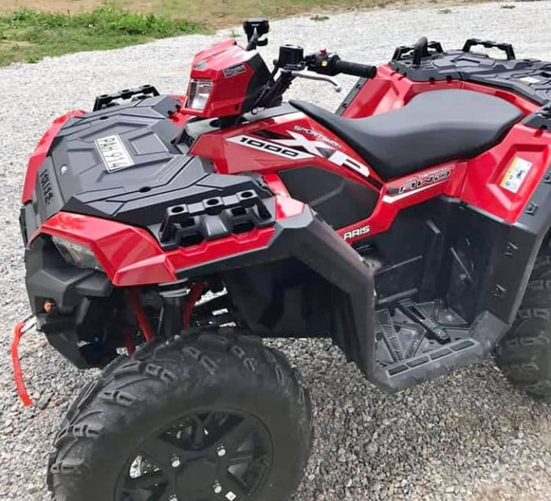 Röd Polaris Sportsman XP 1000 EPS med plogblad stulen i Leksand