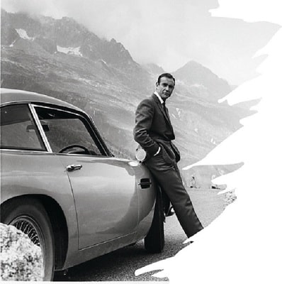 Sean Connery and his Aston Martin DB5 in which he chases Goldfinger.