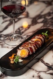 Black Truffle Roasted Duck and Honey-Glazed Iberico Char sui with Salted Egg Yolk.