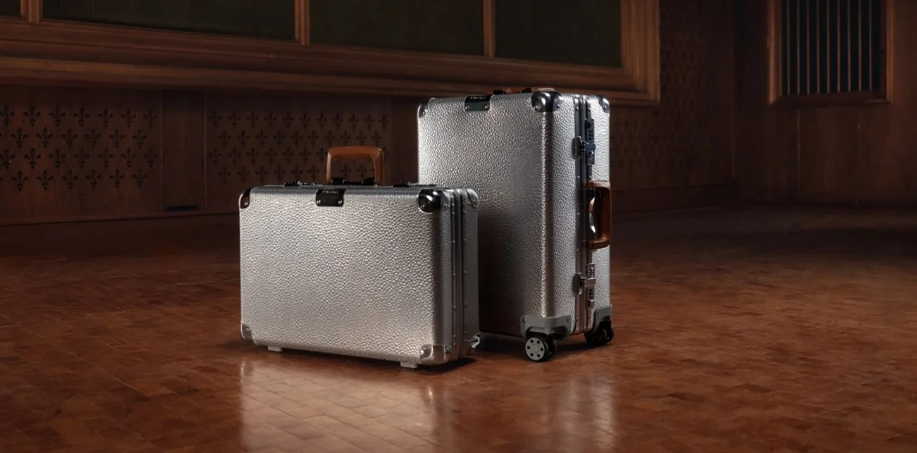 Rimowa's 1898 limited edition luggage featureing cognac leather handles, and dual-organization interiors.