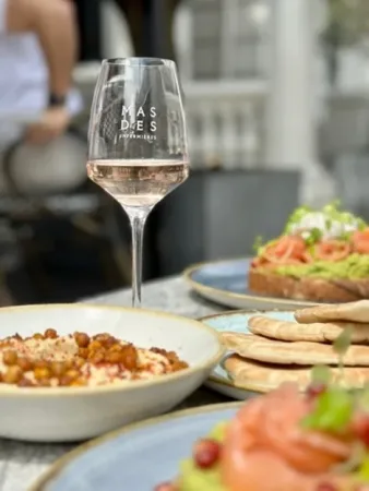 Source Rosé by Ridley Scott's Mas des Infirmières with hummus dip and salmon & Avocado from The Laslett menu brunch.