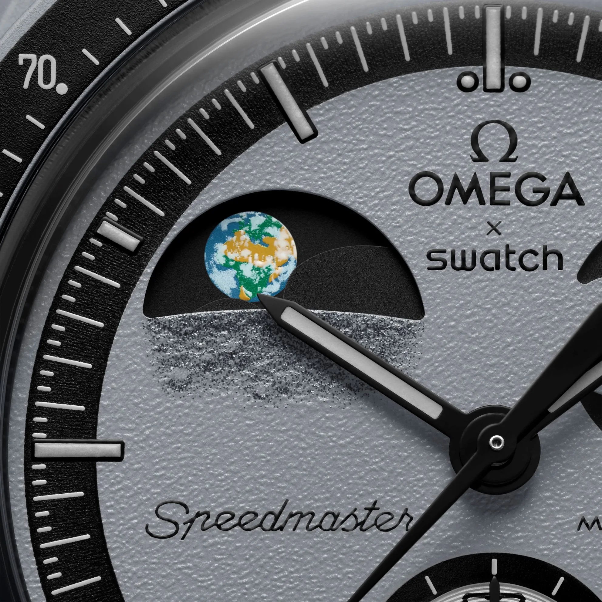 Detail of Earth on the dial of the Omega x Swath Mission to Earthphase.