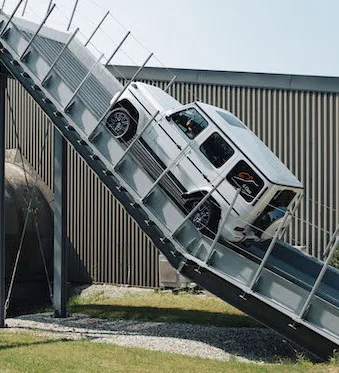 The "Iron Schöckl" – a metallic ramp with a 100 percent incline (45° angle) at the Mercedes-Benz G-Class Experience Center in Graz.
