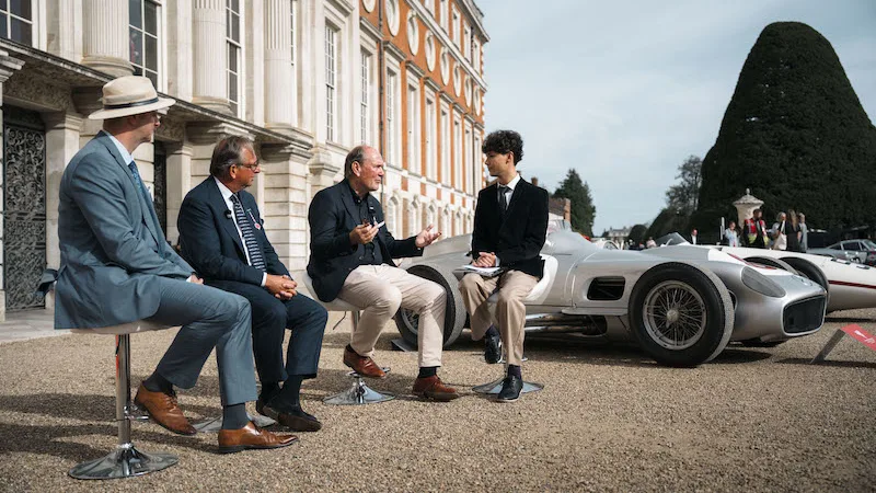 I-M Inquisitive Minds' Social Media Editor, Yanis Mardel (far right), interviewing (from the left) Peter Becker – Classic Communications Spokesperson for Mercedes-Benz Heritage, Simon Curley – Chairman of Henry Poole & Co – and Marcus Breitschwerdt, CEO of Mercedes-Benz Heritage.