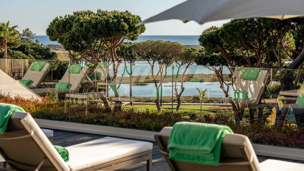 View of the Ria Formosa Natural Park and lagoon from the main pool deck at Hotel Quinta do Lago.