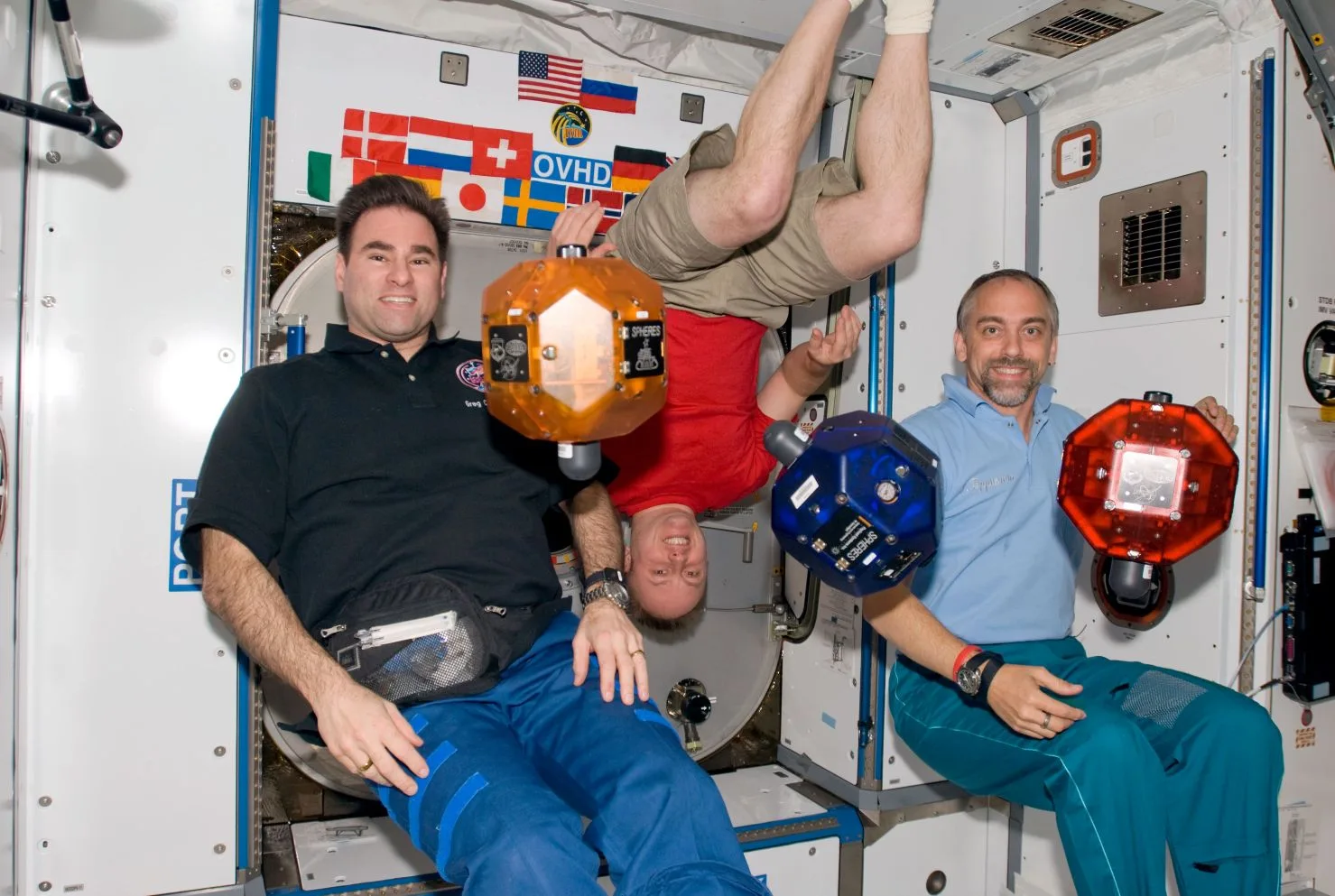 Richard Garriott (far right) on board the ISS wearing the Seiko Spring Drive Spacewalk,