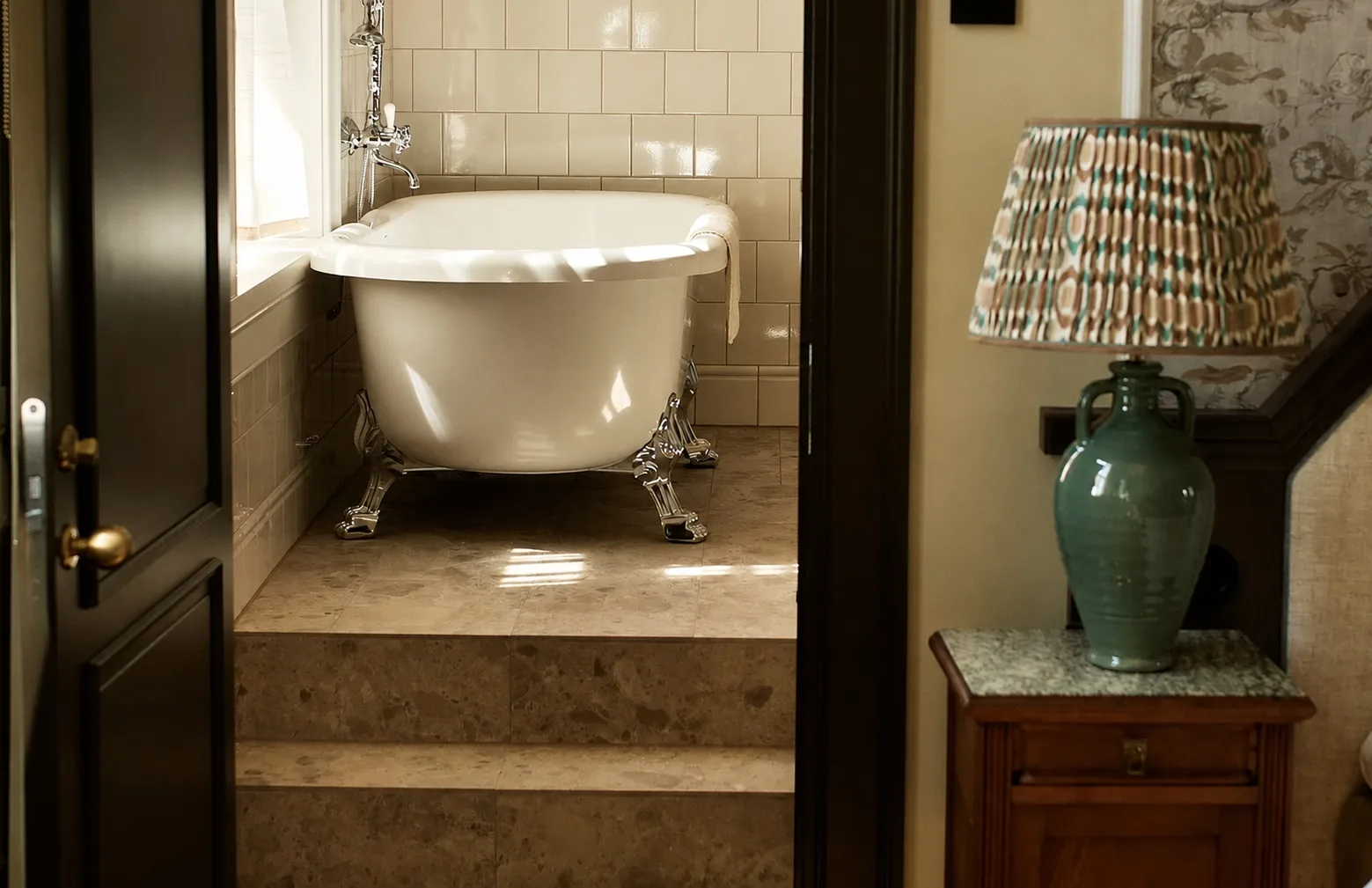 Bathtub in the elegant bathroom of a Deluxe Room at Hotel Savoy 1918, Oslo