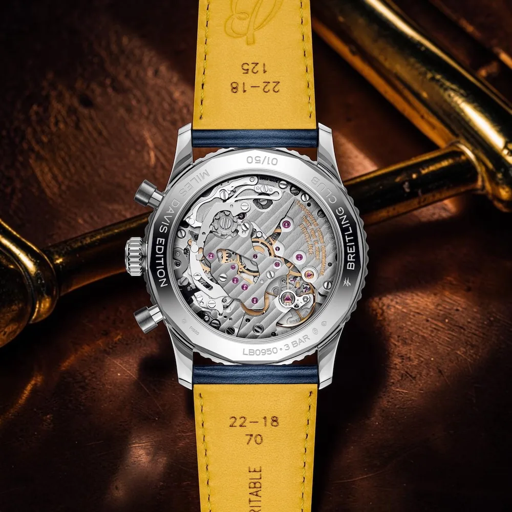 Through the sapphire caseback of the Breitling Navitimer Miles Davis, the hand-wound Breitling Manufacture Calibre B09 reveals its intricate mechanics.