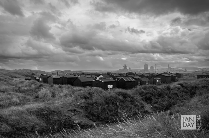 Fisherman’s huts on South Gare sit in the shadow of the former Redcar steelworks.