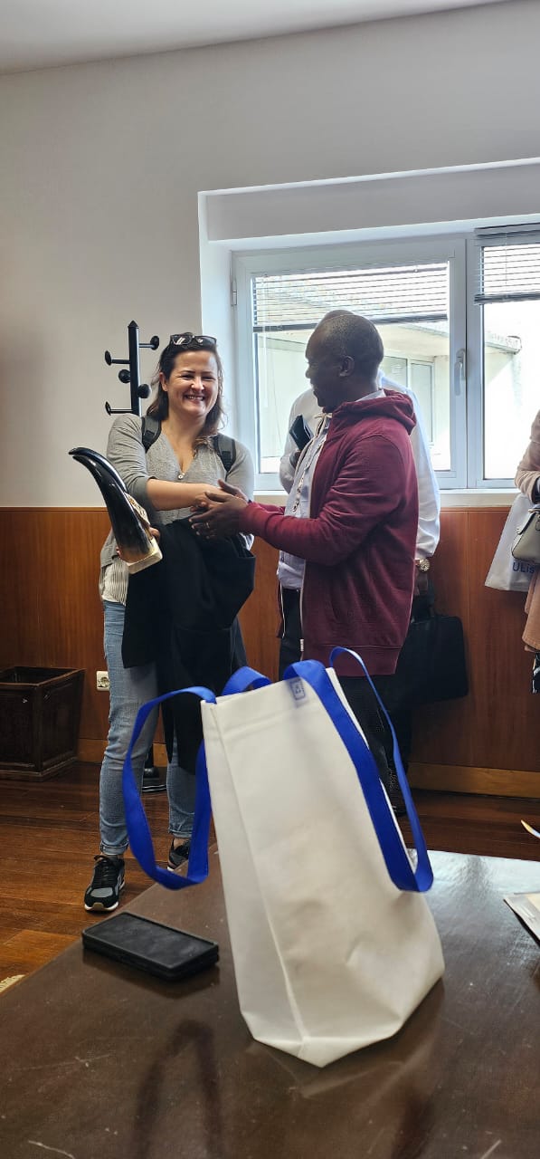 ICT-4MRPQ Project Coordinator gives Prof Anna and Prof Teresa a souvenir from Uganda in appreciation for their efforts towards a successful first international Mobility Programme