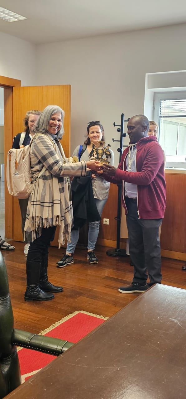 ICT-4MRPQ Project Coordinator gives Prof Anna and Prof Teresa a souvenir from Uganda in appreciation for their efforts towards a successful first international Mobility Programme