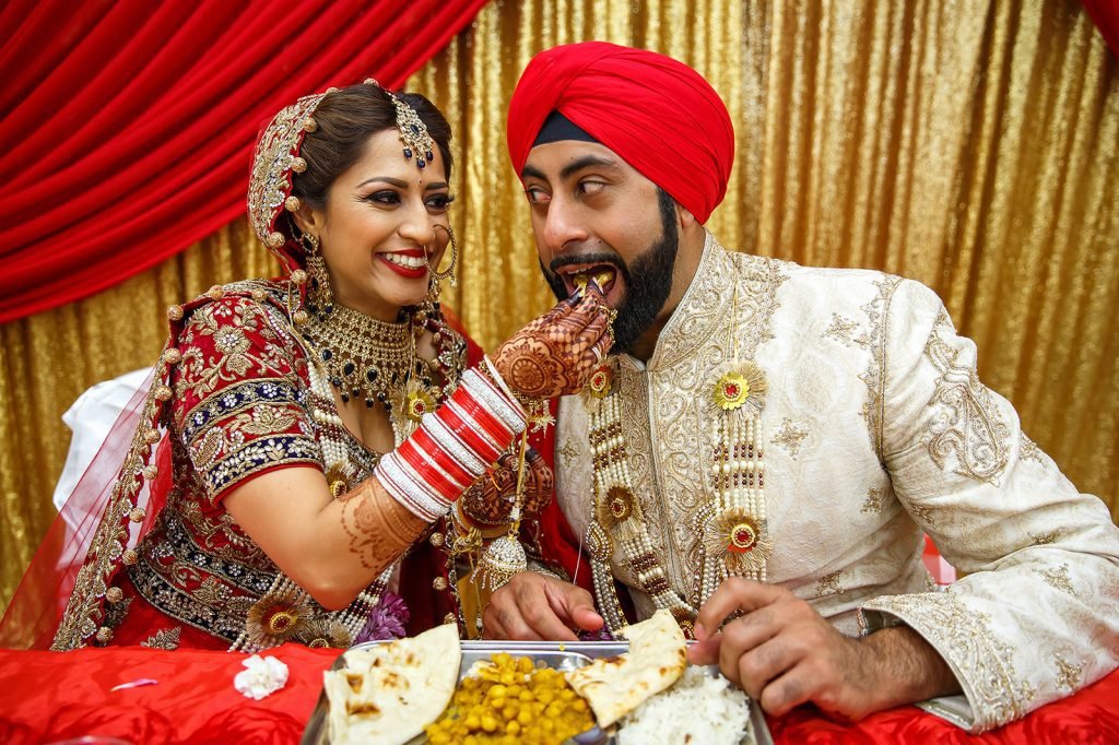 bride feeding groom