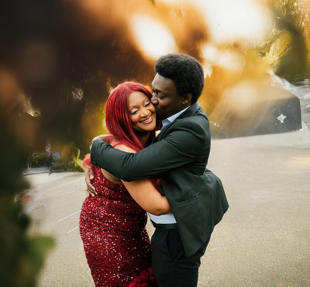 Couple embracing in elegant attire outdoors.