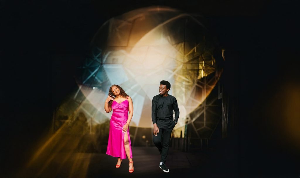 Couple posing in stylish evening attire.